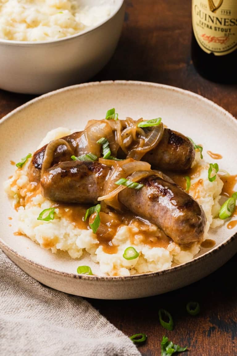 Irish Bangers And Mash With Guinness Onion Gravy The Travel Palate