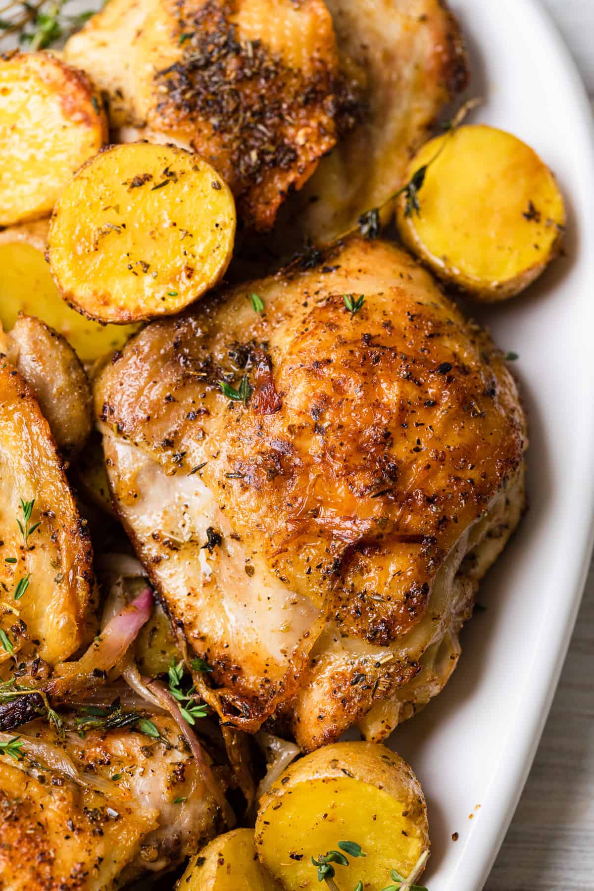Juicy Air Fryer Chicken Thighs and Crispy Potatoes - The Travel Palate