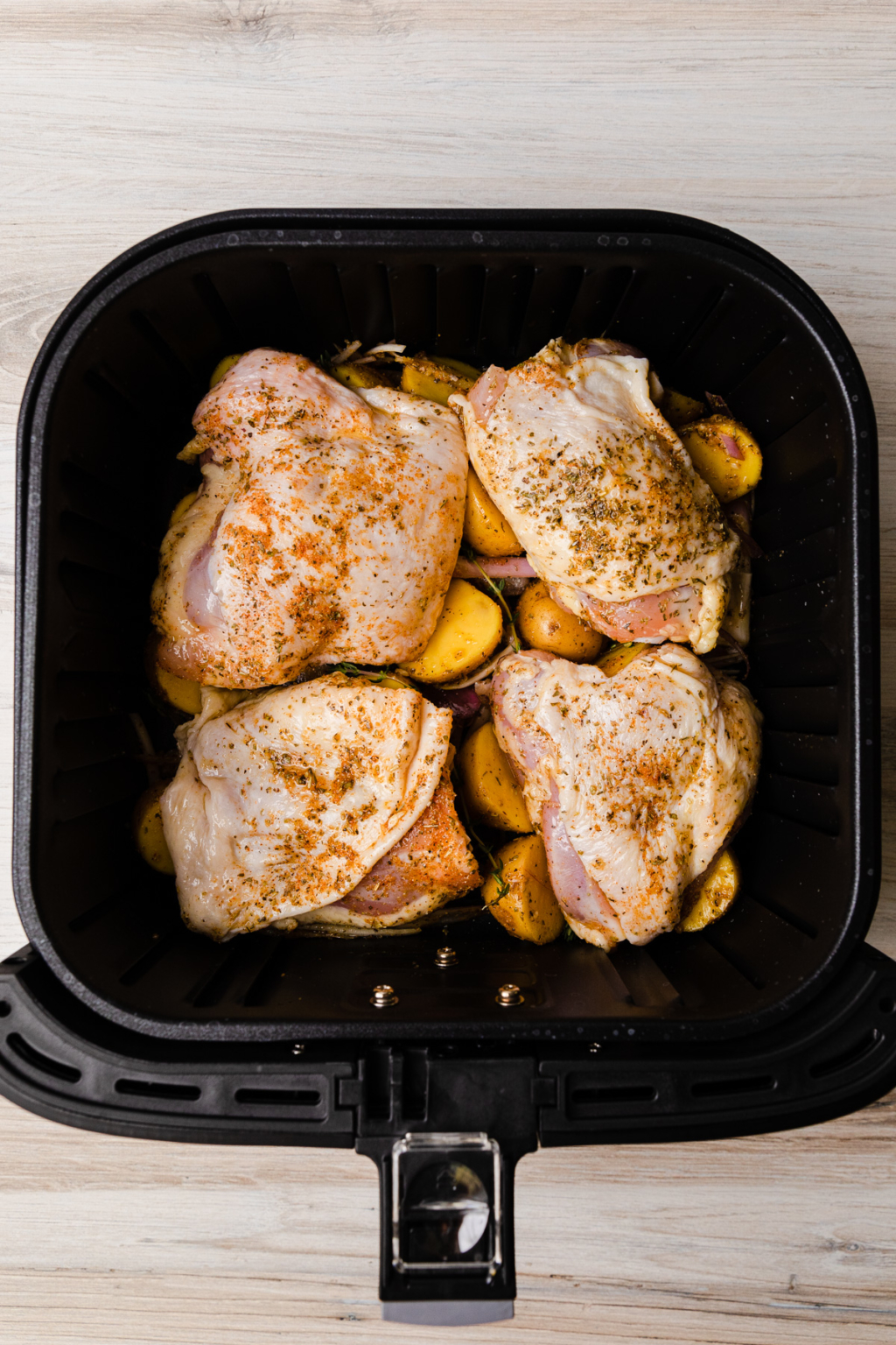 Juicy Air Fryer Chicken Thighs and Crispy Potatoes - The Travel Palate