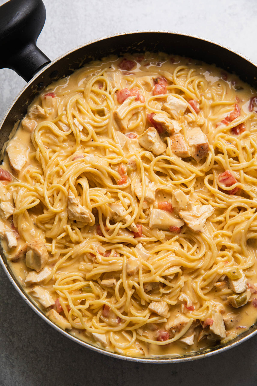 Amazing Cheesy Texas Chicken Spaghetti One Pan Recipe - The Travel Palate