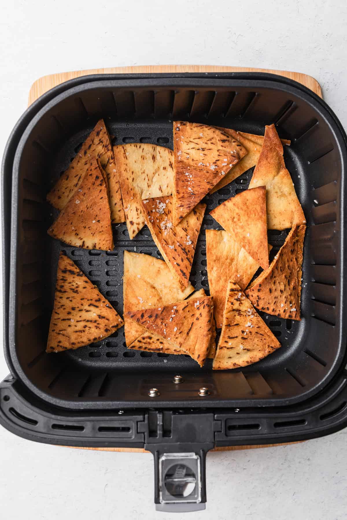 Pita triangles after air frying.