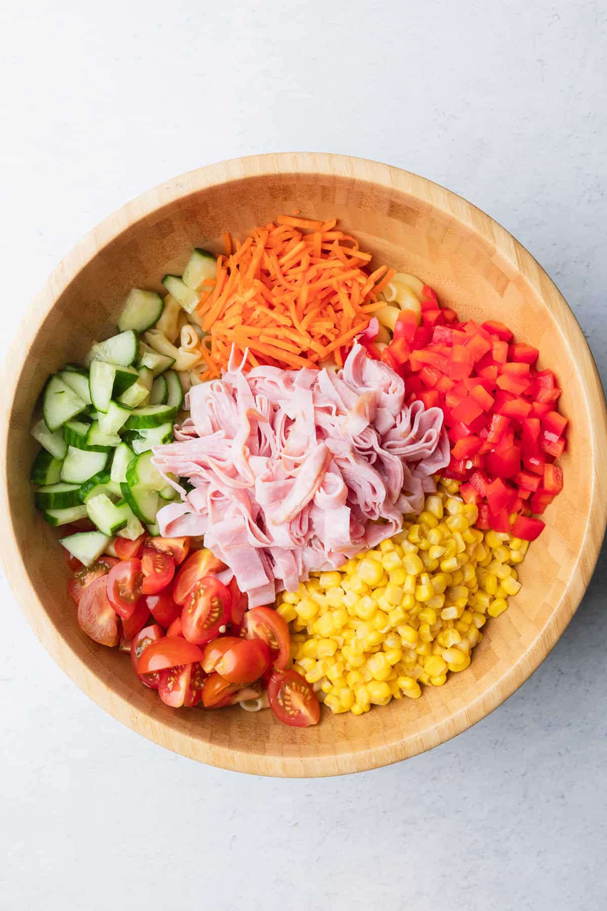 The salad ingredients in a bowl.
