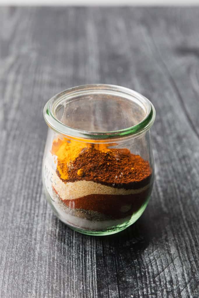 Spices ready in a jar to make a seasoning blend.