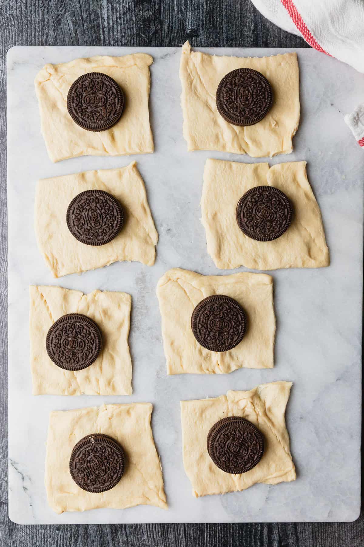 Oreos on pieces of crescent dough.