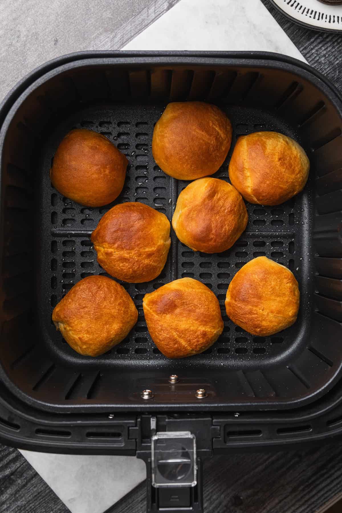 Golden brown air fried oreos in the basket.