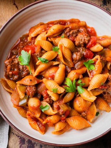 American chop suey with ground beef in a bowl.