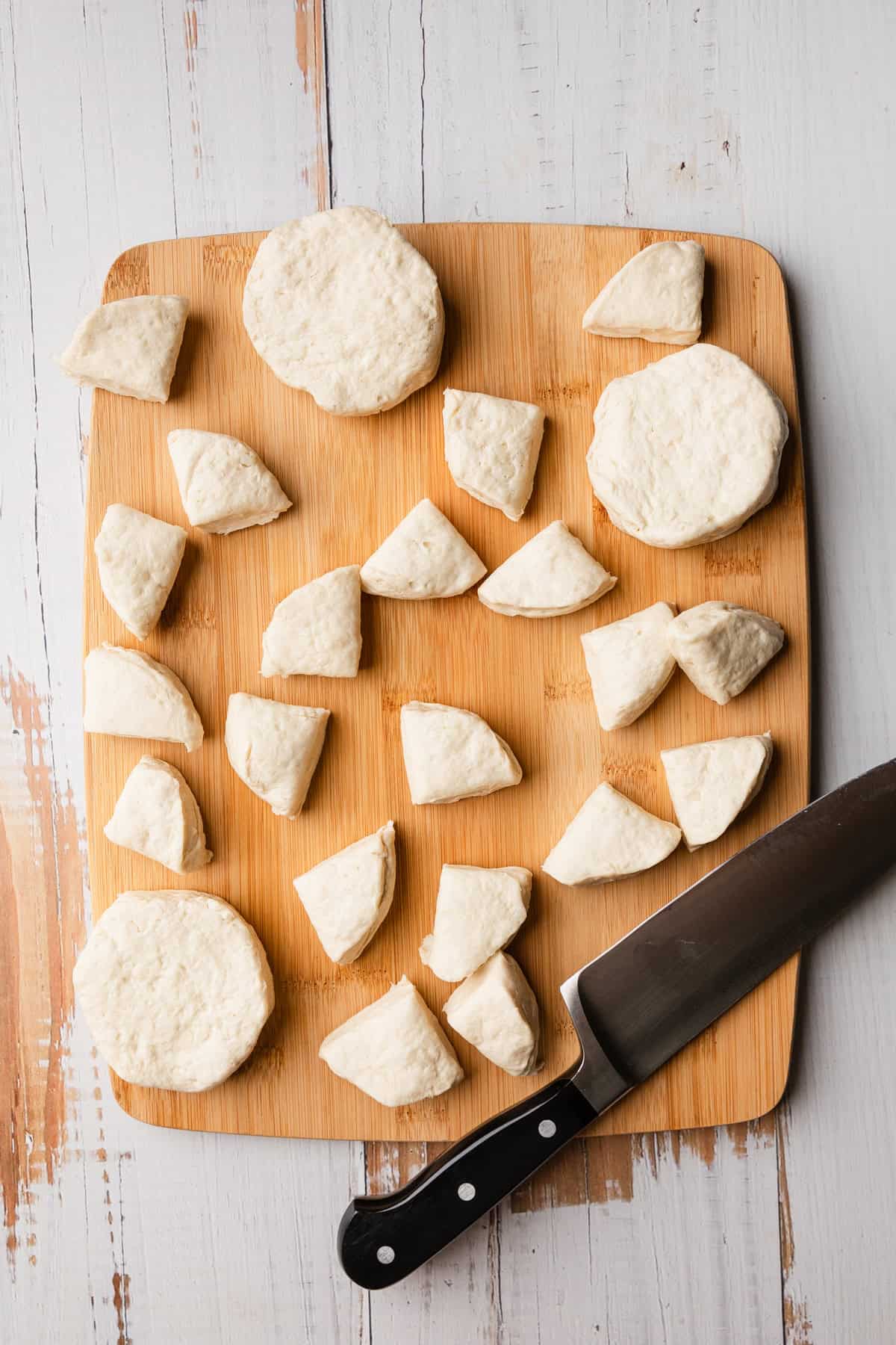 Cut up biscuits for the recipe.