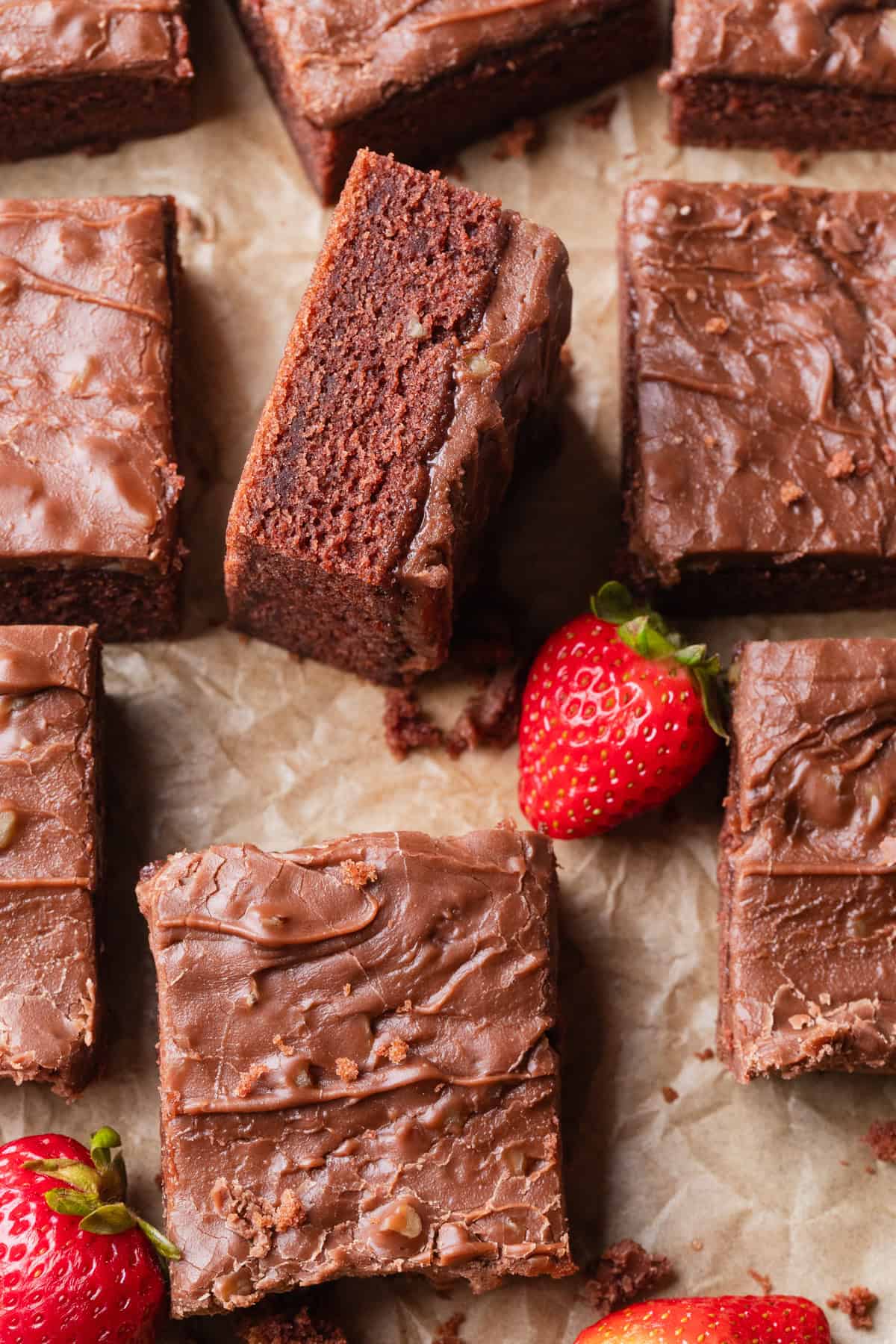 Buttermilk sheet cake sliced into pieces.