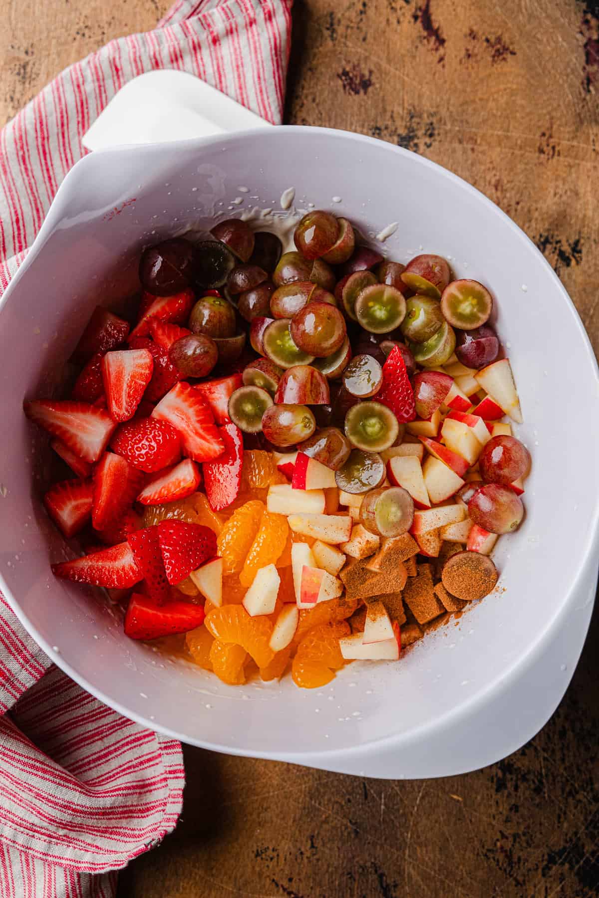 Cut fresh fruit along with drained canned fruit.