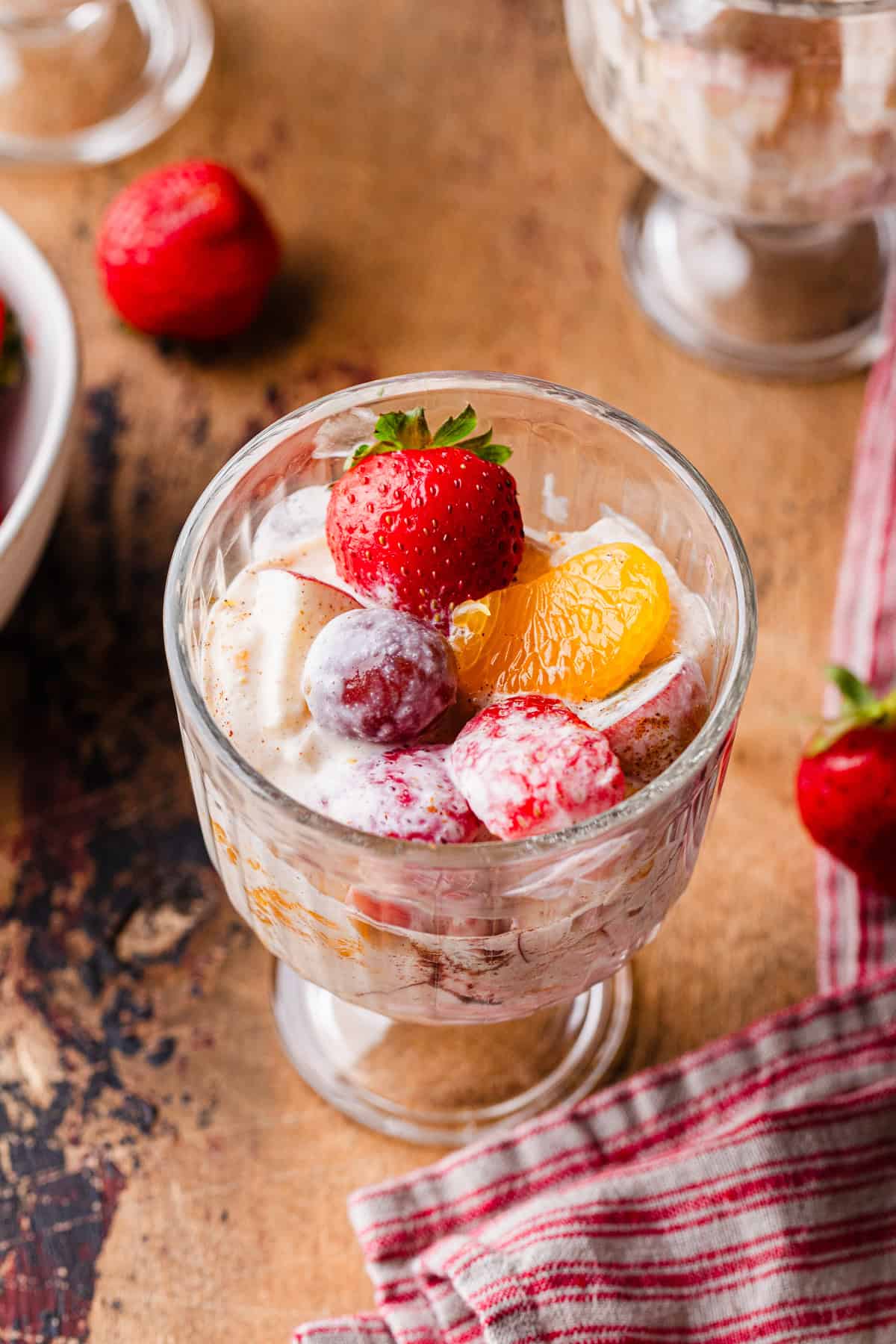 Fruit salad in a glass cup.