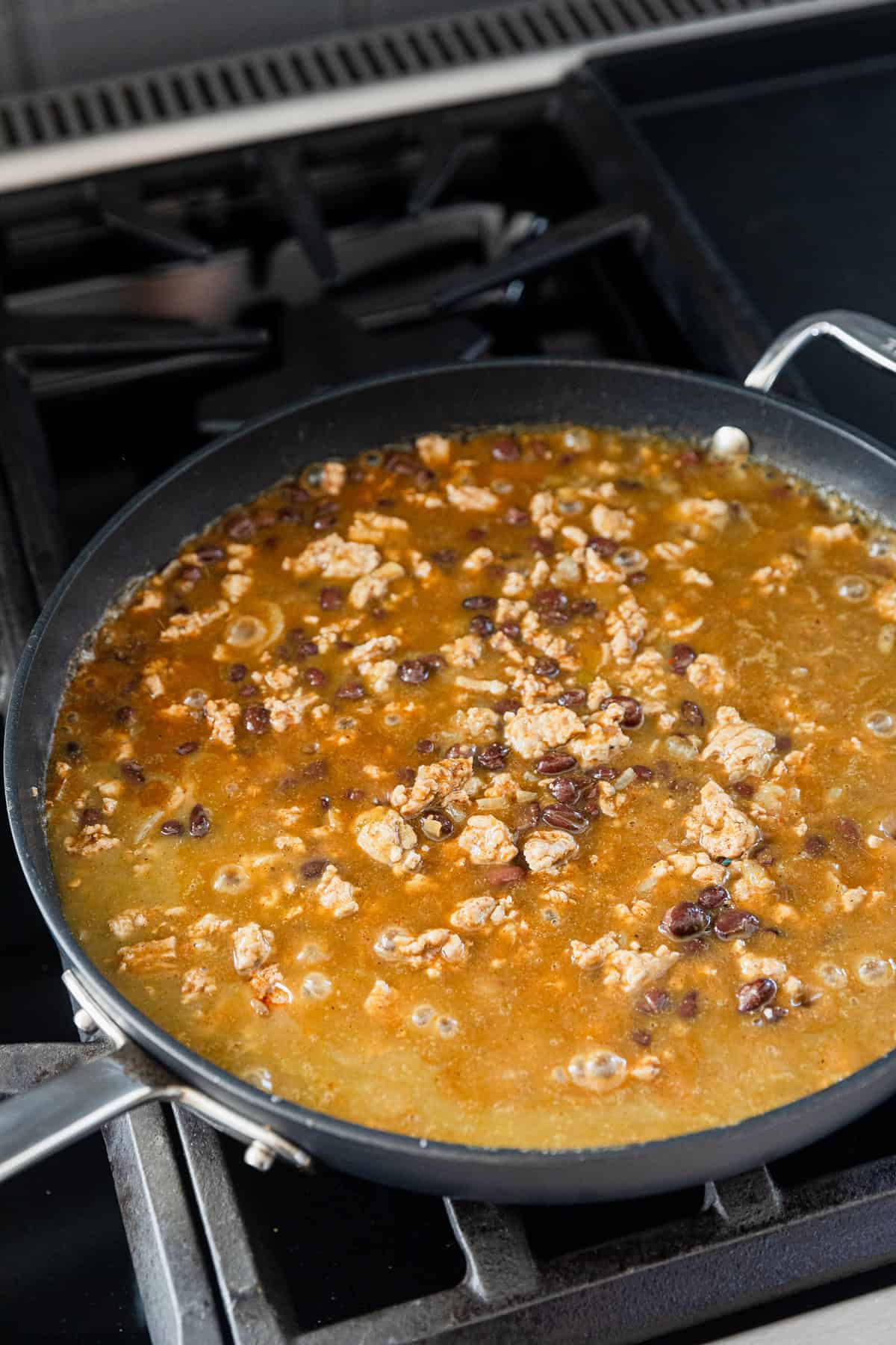 Simmering meat and sauces.