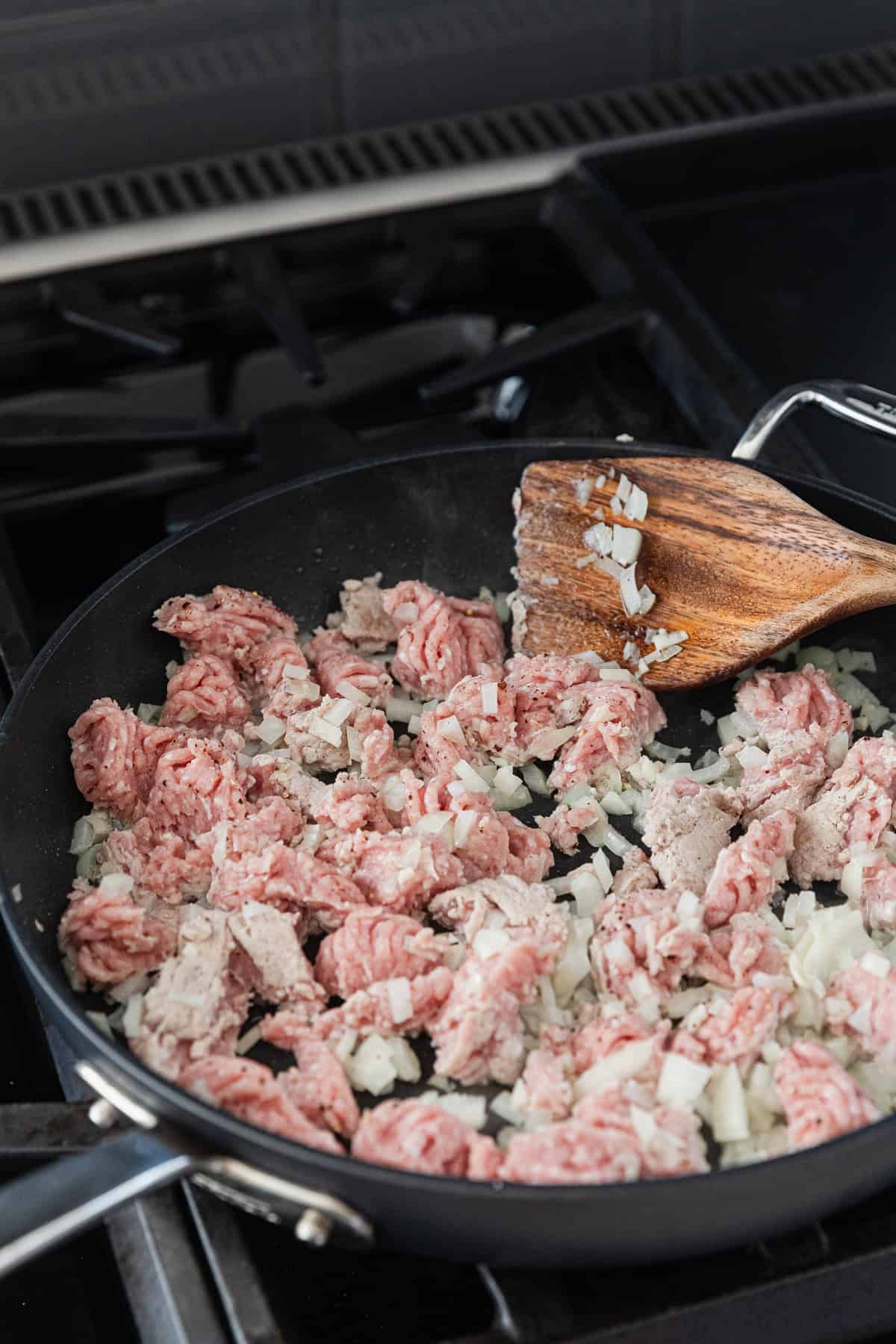 Cooking ground turkey and onions.