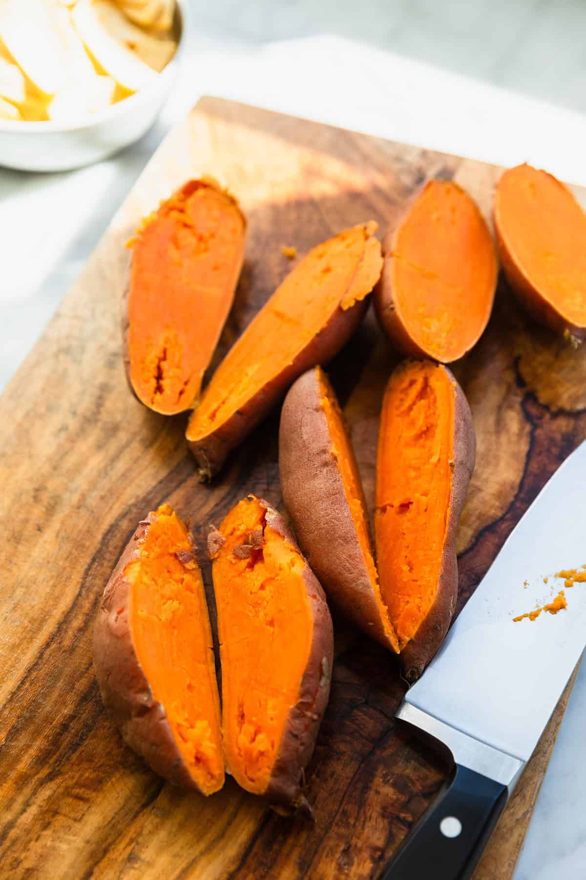 Microwaved sweet potatoes cut in half.