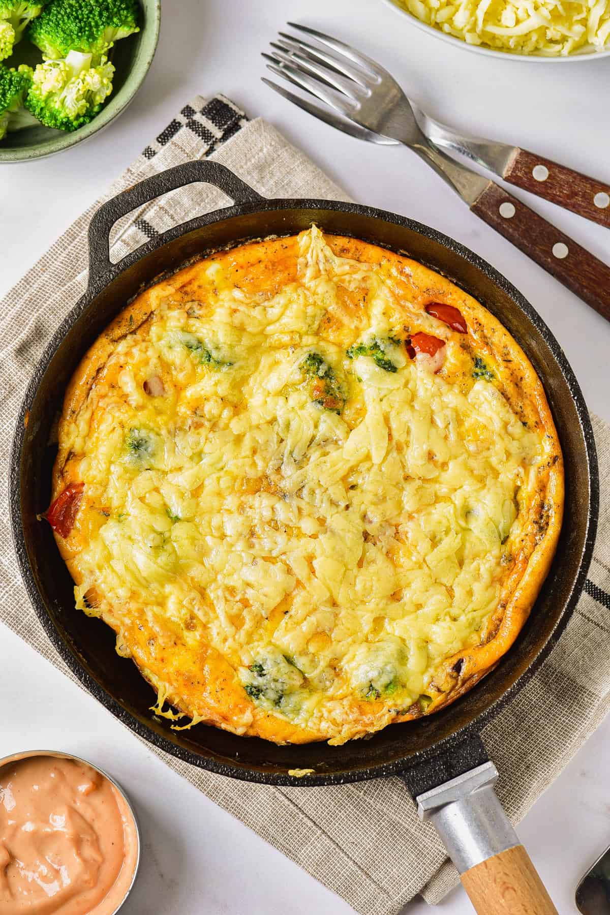 Vegetable frittata recipe baked in a cast iron skillet.