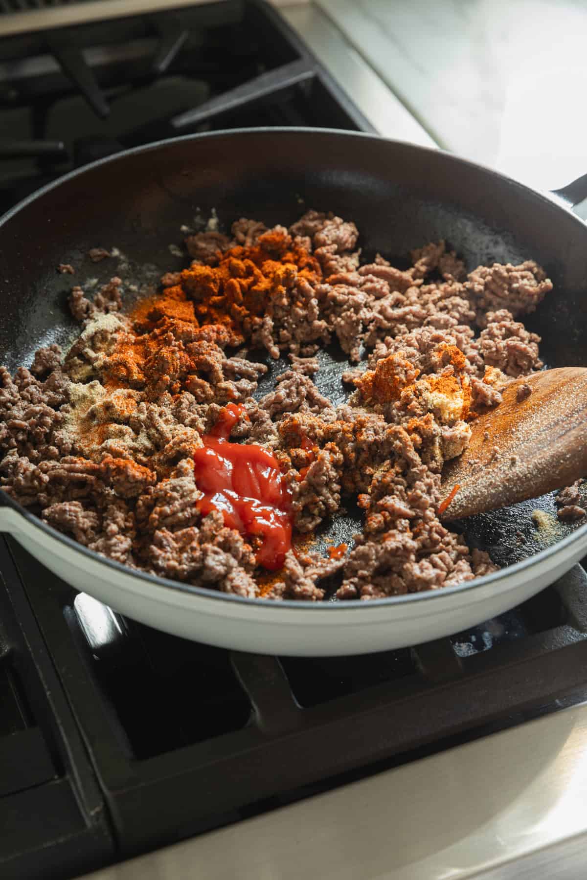 Cooking ground beef in a skillet.