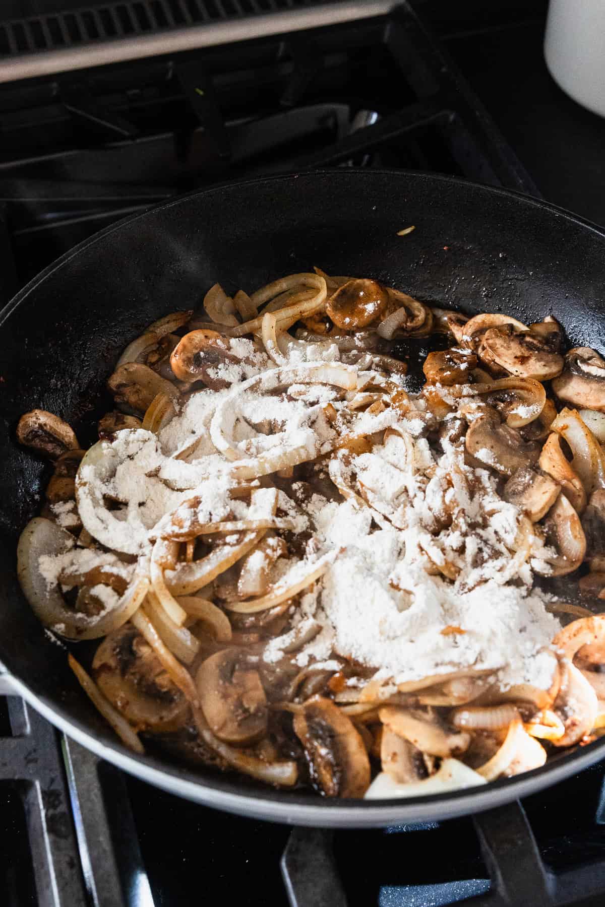 Flour added to the cooked vegetables to make a gravy.