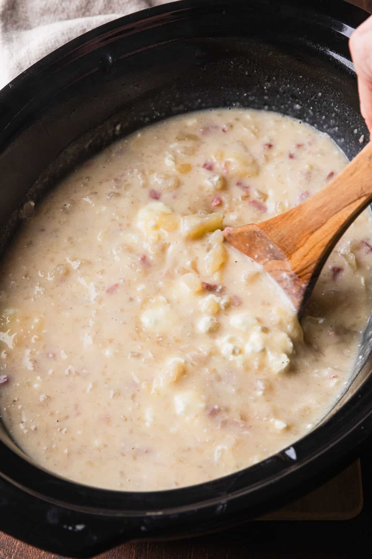 Stirring all the soup ingredients together until creamy.