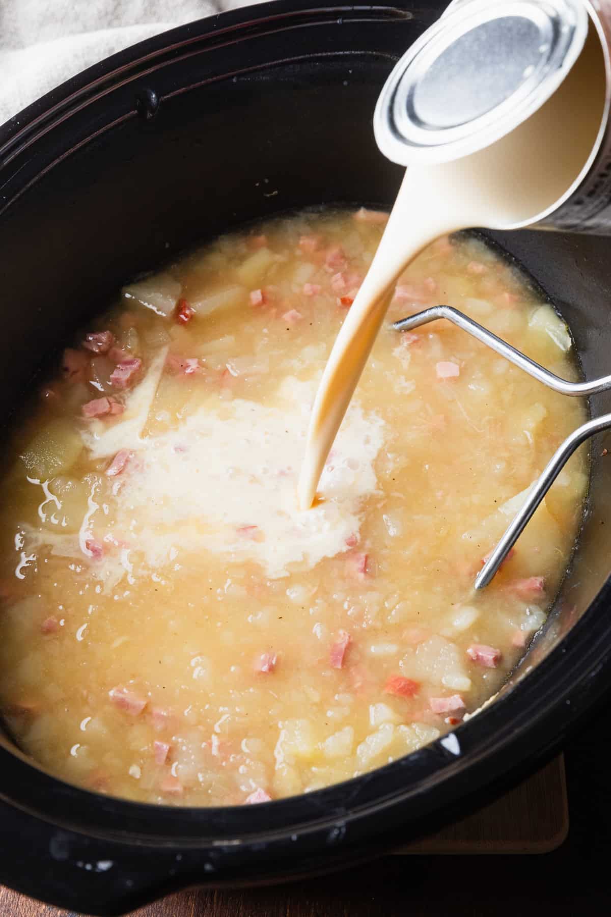 Add evaporated milk to crockpot.