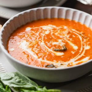 Homemade tomato basil soup in a bowl.