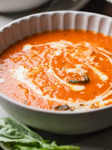 Homemade tomato basil soup in a bowl.