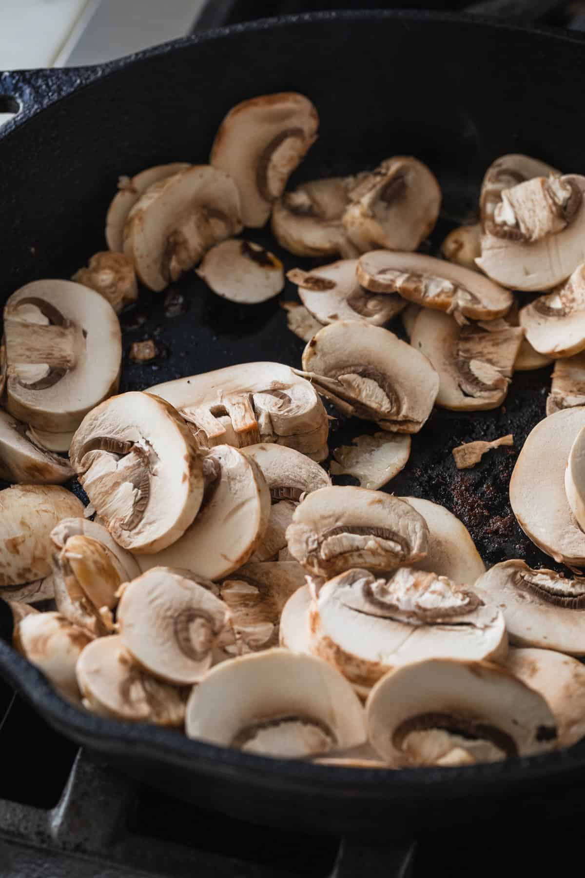 Making a mushroom pan sauce.