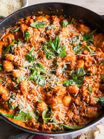 A recipe of gnocchi and sausage in the pan.