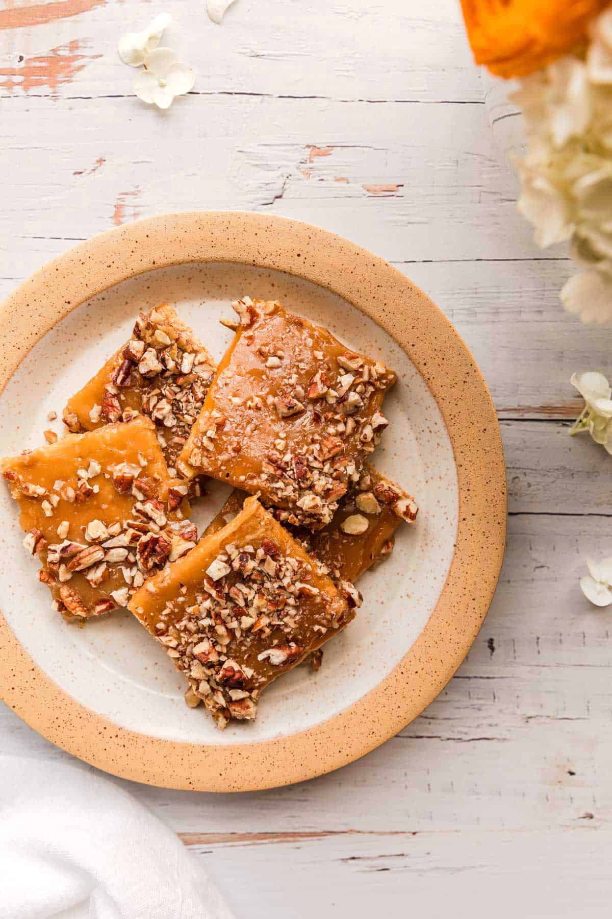 Graham cracker pralines served on a plate.