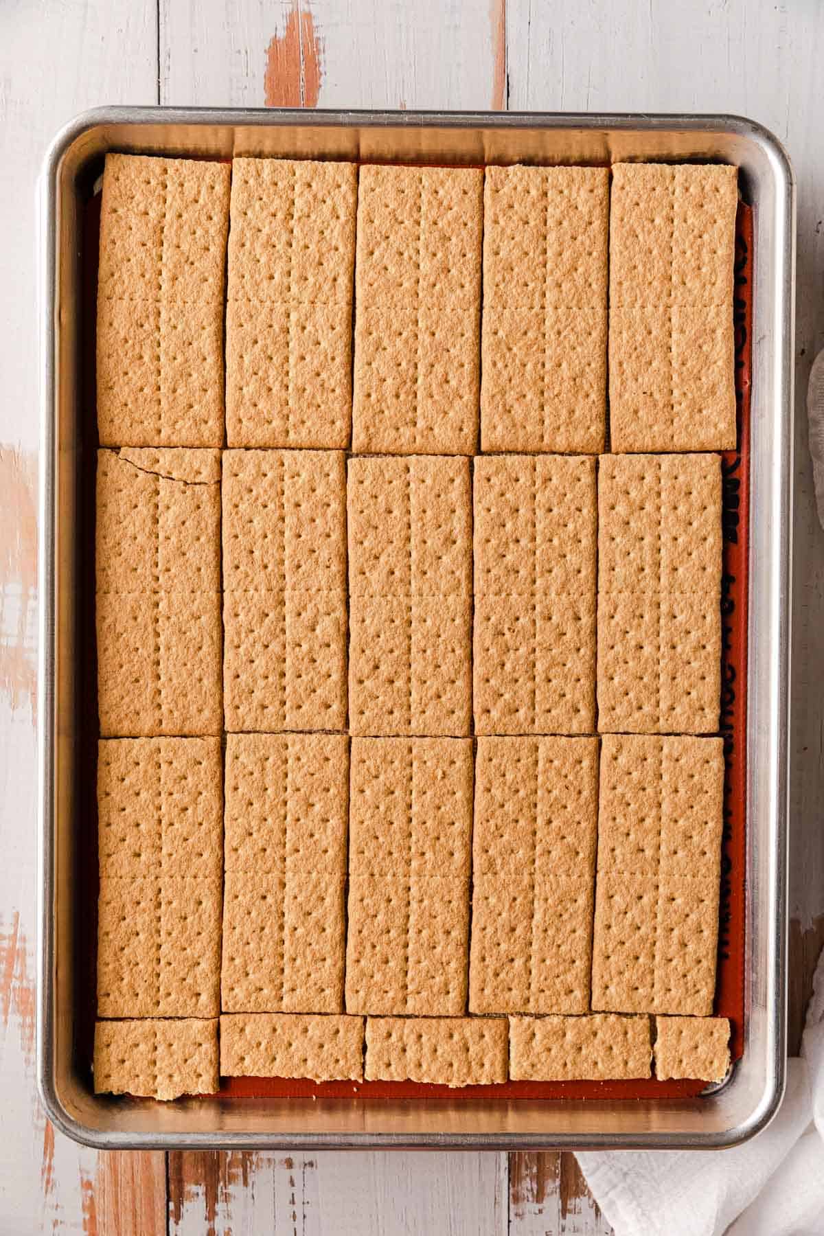 Graham crackers on a large sheet pan.