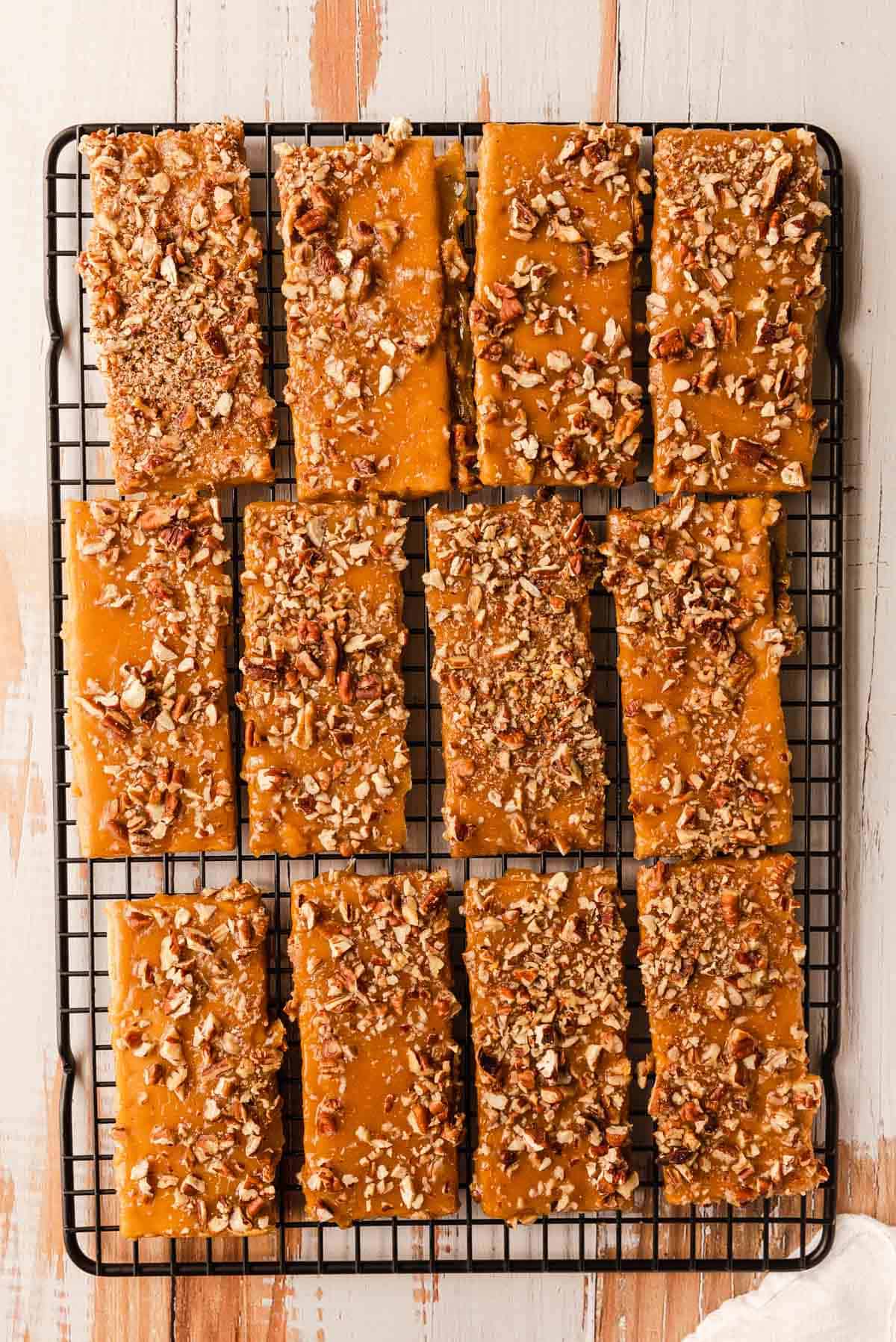 Cooling the graham cracker pralines on a cooling rack.